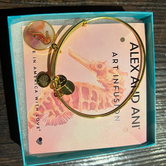 Alex and Ani Jewelry - Alex And Ani pink / salmon colored seahorse charm gold bracelet